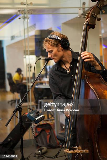 Bassist Chris Wood of Medeski, Martin & Wood performs during Medeski, Martin & Wood on SiriusXM's Jam_On and Real Jazz channels in the SiriusXM...