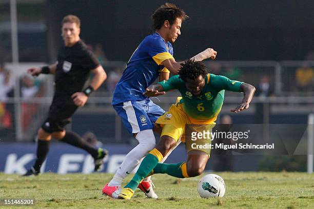 Neymar of Brazil fights for the ball with Lerato Chabangu of South Africa a FIFA friendly match between Brazil and South Africa at Estadio Morumbí on...