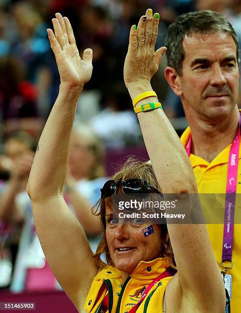 Liesl Tesch of Australia who won Gold in the Two Person Keelboat sailing event cheers on the Australian team during the Women's Wheelchair Basketball...