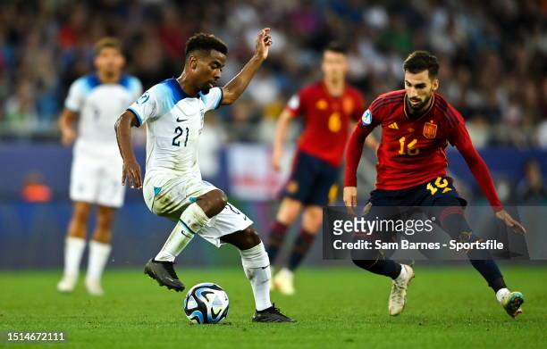 Angel Gomes of England in action against Álex Baena of Spain during the UEFA Under-21 EURO 2023 Final match between England and Spain at the Batumi...