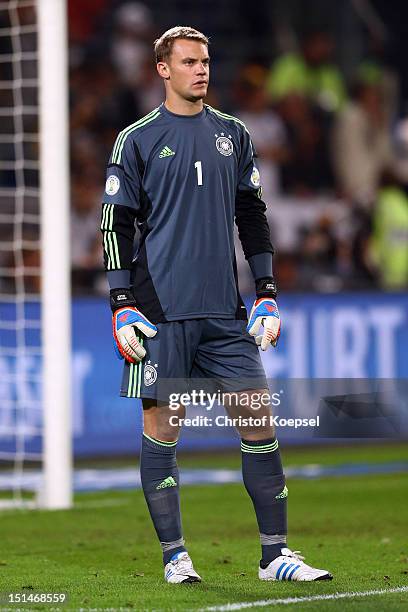Manuel Neuer of Germany looks on during the FIFA 2014 World Cup Qualifier group C match between Germany and Faeroe Islands at AWD Arena on September...