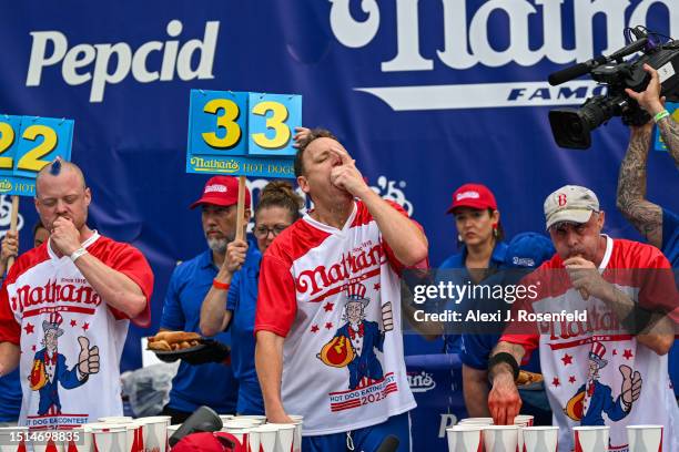 Defending champion Joey Chestnut competes in the 2023 Nathan's Famous Fourth of July International Hot Dog Eating Contest on July 4, 2023 at Coney...