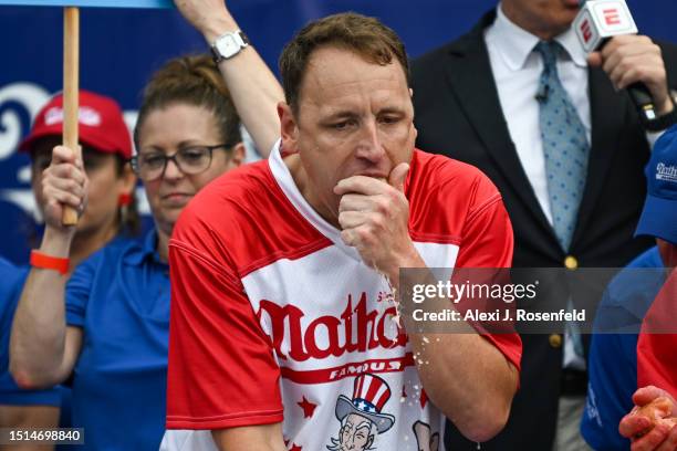 Defending champion Joey Chestnut competes in the 2023 Nathan's Famous Fourth of July International Hot Dog Eating Contest on July 4, 2023 at Coney...