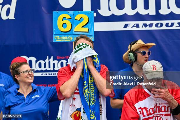 Defending champion Joey Chestnut competes in the 2023 Nathan's Famous Fourth of July International Hot Dog Eating Contest on July 4, 2023 at Coney...