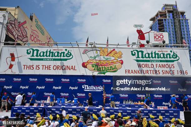 Women compete in the 2023 Nathan's Famous Fourth of July International Hot Dog Eating Contest on July 4, 2023 at Coney Island in the Brooklyn borough...