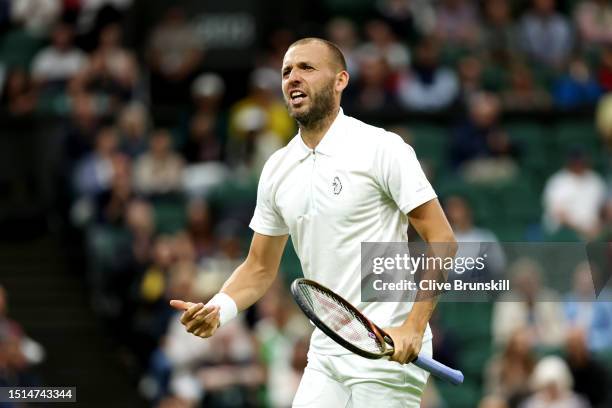 Daniel Evans of Great Britain reacts against Quentin Halys of France in the Men's Singles first round match during day two of The Championships...