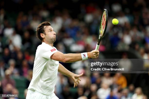 Quentin Halys of France plays a forehand against Daniel Evans of Great Britain in the Men's Singles first round match during day two of The...