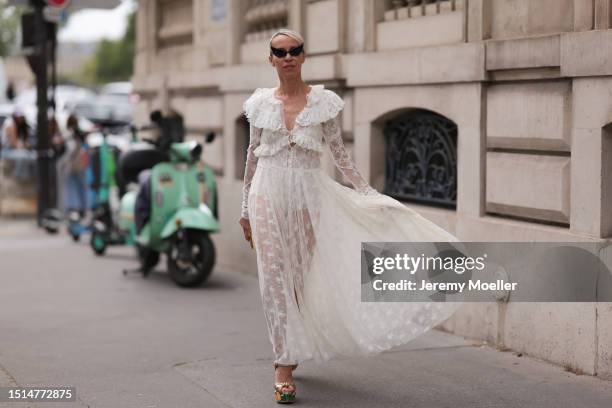 Denisa Palsha seen wearing Philosophy Di Lorenzo Serafini black cat-eye swarovski sunglasses, Philosophy Di Lorenzo Serafini white lace ruffled...