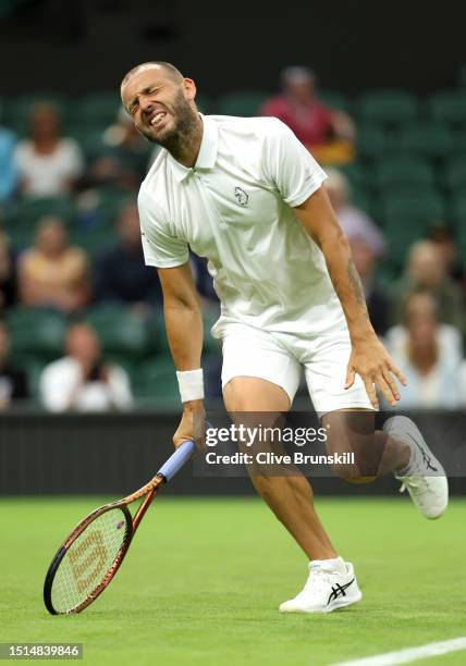 Daniel Evans of Great Britain reacts against Quentin Halys of France in the Men's Singles first round match during day two of The Championships...