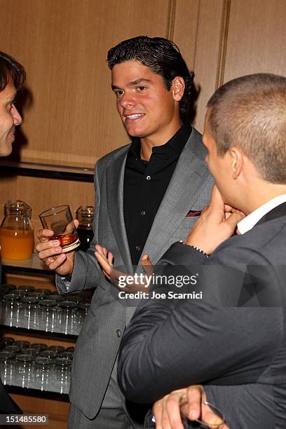 Professional tennis player Milos Raonic attends amfAR Cinema Against AIDS TIFF 2012 during the 2012 Toronto International Film Festival at Shangri-La...