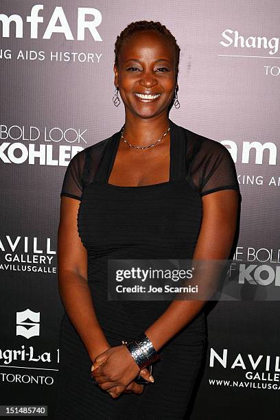 Actress Melanie Nicholls-King attends amfAR Cinema Against AIDS TIFF 2012 during the 2012 Toronto International Film Festival at Shangri-La Hotel on...