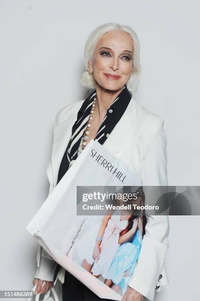 Supermodel Carmen Dell'Orefice attends the "Evening" Sherri Hill show during Spring 2013 Mercedes-Benz Fashion Week at Trump Tower Grand Corridor on...