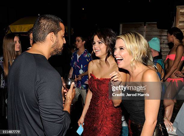 Illusionist David Blaine, Actress Selena Gomez and Actress Ashley Benson attend the vitaminwater post party for the cast of "Spring Breakers" during...