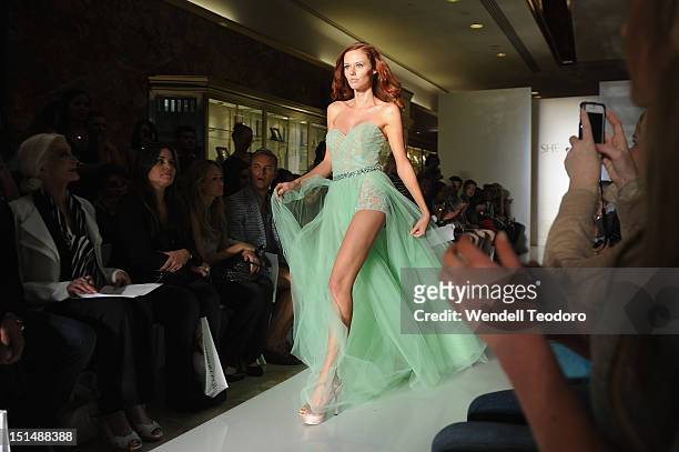 Miss USA 2011 Alyssa Campanella attends the "Evening" Sherri Hill show during Spring 2013 Mercedes-Benz Fashion Week at Trump Tower Grand Corridor on...
