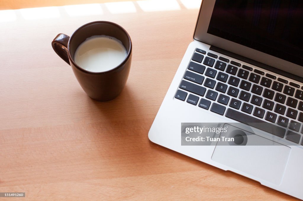 Laptop with coffee