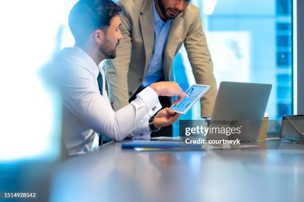 2 business men working in the office. - customer data stock pictures, royalty-free photos & images