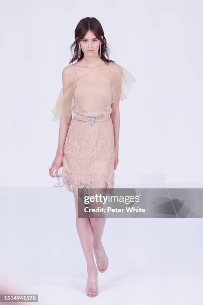 Model walks the runway during the Alexis Mabille Haute couture Fall/Winter 2023/2024 show as part of Paris Fashion Week on July 04, 2023 in Paris,...
