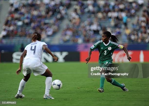 Gloria Ofoegbu of Nigeria and Crystal Dunn of USA compete for the ball during the FIFA U-20 Women's World Cup Japan 2012, Semi Final match between...