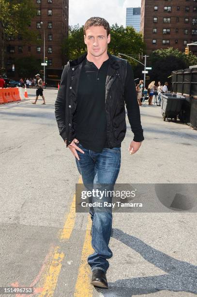 Olympic swimmer Ryan Lochte enters the Mercedes-Benz Fashion Week at The Theatre at Lincoln Center on September 7, 2012 in New York City.