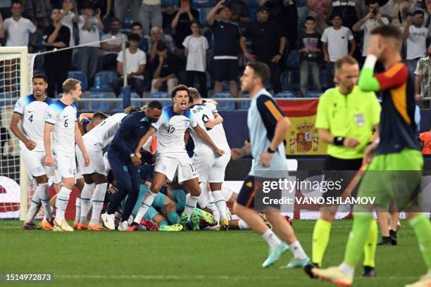 England's players celebrate winning the UEFA European Under-21 Championship final football match between England vs Spain at Batumi Arena in Batumi...
