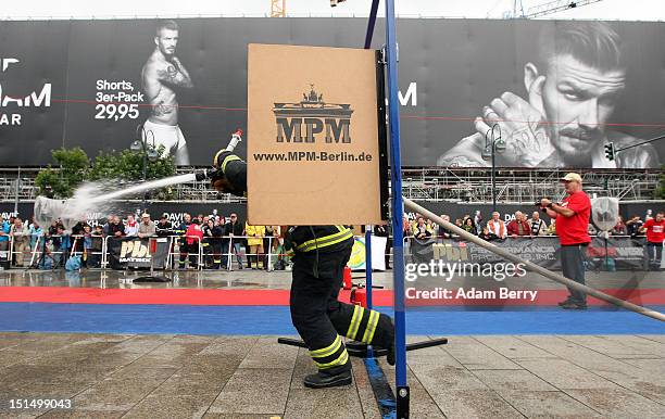 Fireman Rushes 40 6th Firefighter Combat Challenge Stock Photos, High-Res Pictures ...