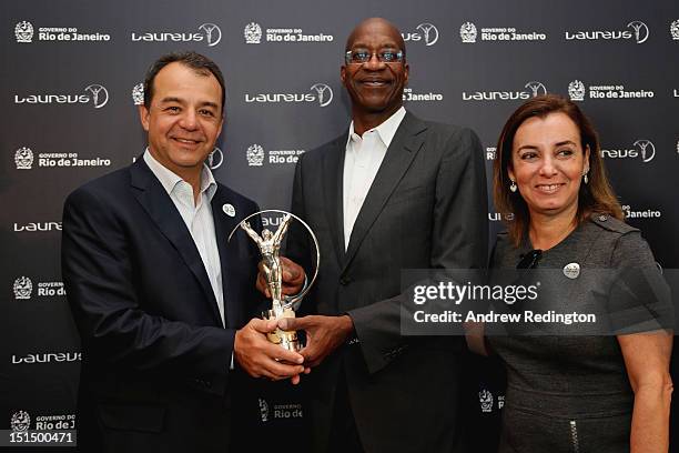 Sergio Cabral, Governor of the State of Rio de Janeiro, Edwin Moses, Chairman of Laureus, and Marcia Lins, Secretary of Sports and Leisure of the...