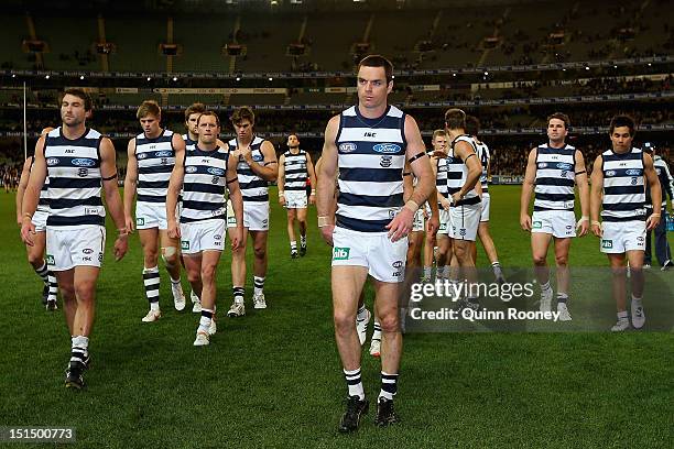 Matthew Scarlett of the Cats leads his team off the field after being defeated by the Dockers in the Second AFL Elimination Final match between the...