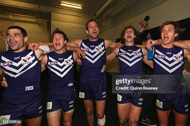 The Dockers sing the song in the rooms after winning the Second AFL Elimination Final match between the Geelong Cats and the Fremantle Dockers at the...