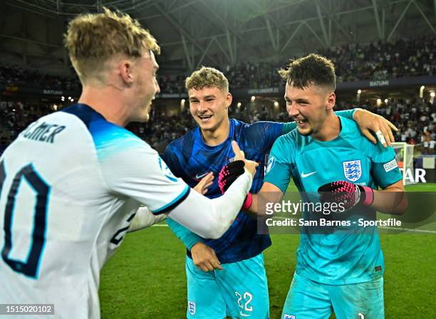 England goalkeeper James Trafford, right, celebrates with teammates Carl Rushworth, centre, and Cole Palmer of England after the UEFA Under-21 EURO...