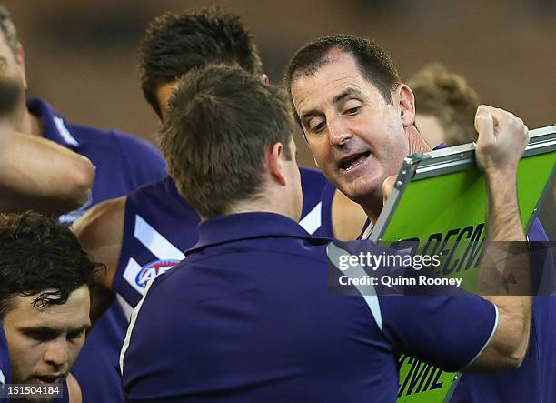 Ross Lyon the coach of the Dockers speaks to his players during the Second AFL Elimination Final match between the Geelong Cats and the Fremantle...