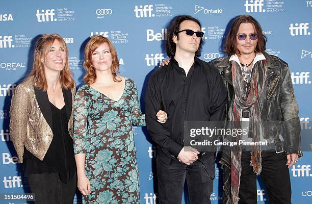 Director Amy Berg, Lorri Davis, Damien Echols and actor Johnny Depp attend the "West of Memphis" photo call during the 2012 Toronto International...