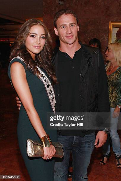 Miss USA Olivia Culpo and swimmer Ryan Lochte attend the Evening Sherri Hill spring 2013 fashion show during Mercedes-Benz Fashion Week at Trump...
