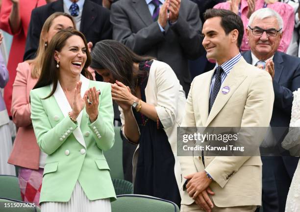 Catherine, Princess of Wales and Roger Federer in the Royal Box on day two of the Wimbledon Tennis Championships at All England Lawn Tennis and...