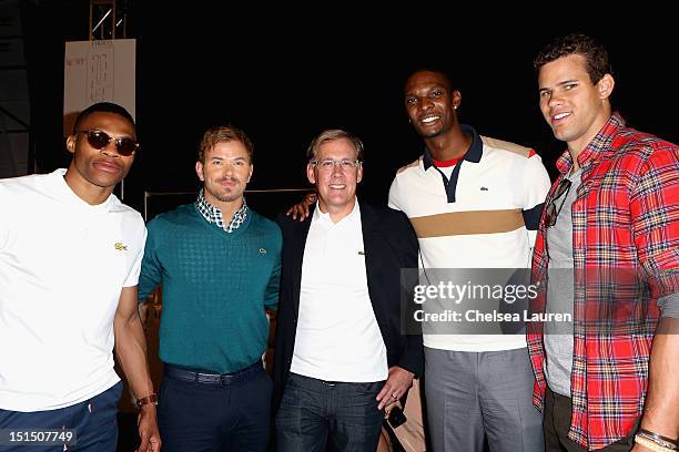 Player Russell Westbrook, actor Kellan Lutz, Lacoste CEO Steve Birkhold, NBA player Chris Bosh and NBA player Kris Humphries pose backstage at the...