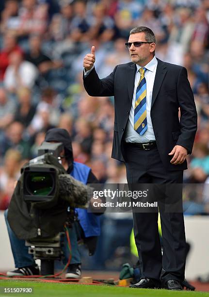 Craig Levein of Scotland reacts during the FIFA 2014 World Cup Qualifier at Hampden Park between Scotland and Serbia on September 8, 2012 in Glasgow,...