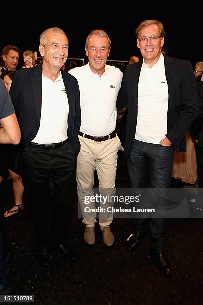 President of Lacoste Michel Lacoste, CEO of Lacoste Christophe Chenut and CEO of Lacoste USA Steve Birkhold pose backstage at the Lacoste Spring 2013...