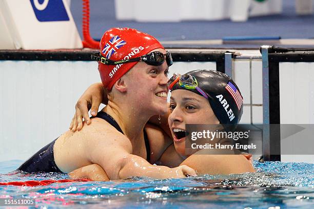 Gold medallist Victoria Arlen of the United States celebrates with silver medallist Eleanor Simmonds of Great Britain after competing in the Women's...