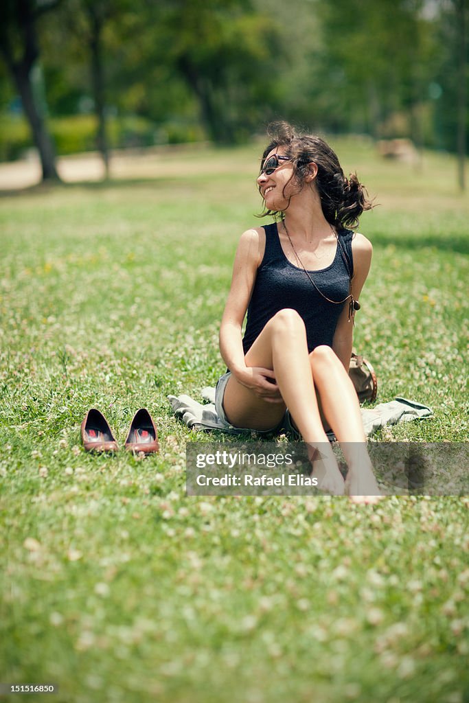 Woman sitting on grass