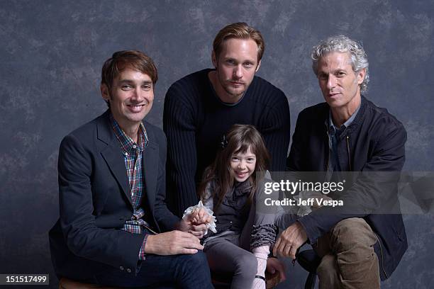 Director Scott McGehee, Alexander Skarsgård, actress Onata Aprile and director David Siegel of "What Maisie Knew" pose at the Guess Portrait Studio...