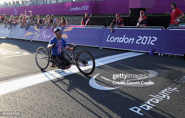 Oscar Sanchez of USA crosses the line to win gold in the Mixed H 1-4 relay on day 10 of the London 2012 Paralympic Games at Brands Hatch on September...