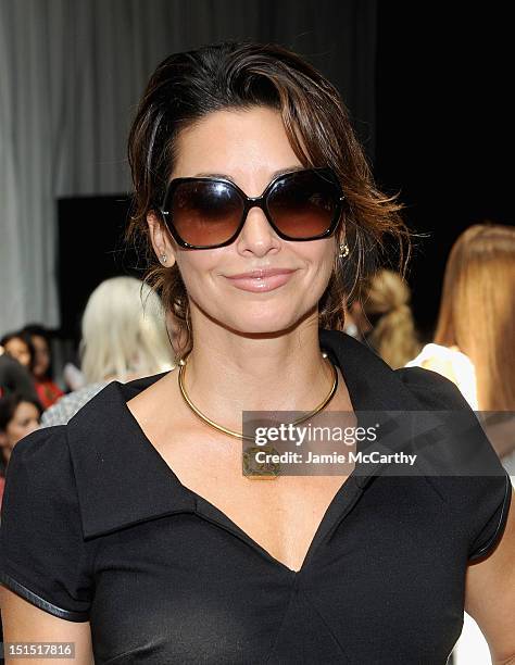 Gina Gershon attends the Edun show during Spring 2013 Mercedes-Benz Fashion Week at Skylight at Moynihan Station on September 8, 2012 in New York...