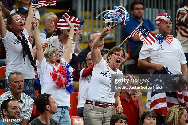 Fans from the United States cheer during the Mixed Wheelchair Rugby - Open semi-final match between the United States and Canada on Day 10 of the...