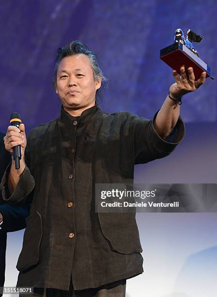 Director Kim Ki-Duk receives the Golden Lion Award for best film during the Award Ceremony during The 69th Venice Film Festival at the Palazzo del...