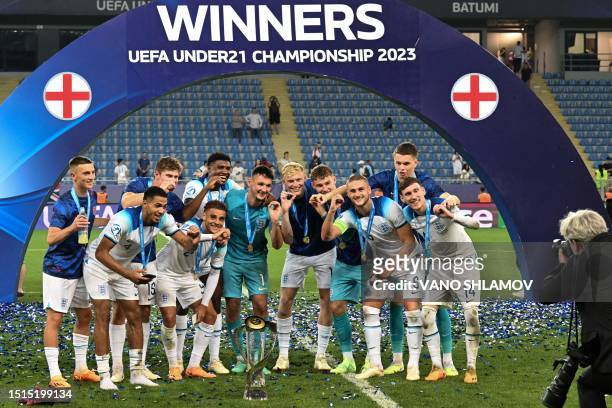 England's players celebrate with the trophy after winning the UEFA European Under-21 Championship final football match between England vs Spain at...