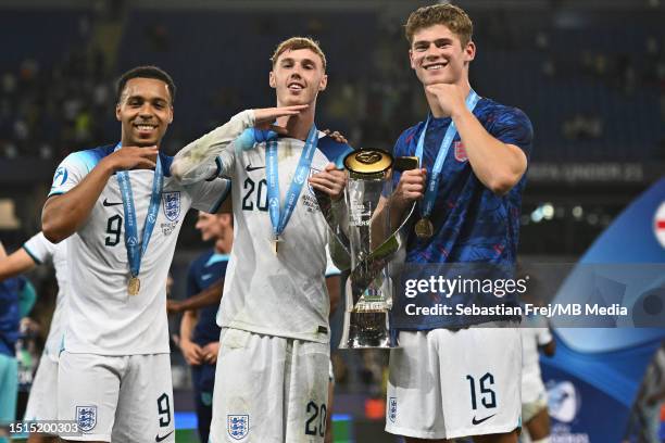 England's players Cameron Archer, Cole Palmer, Charlie Cresswell celebrate with the trophy after winning the UEFA European Under-21 Championship...