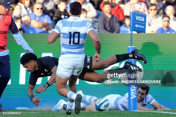 New Zealand's Emoni Narawa scores a try during the Rugby Championship 2023 first round match between Argentina's Los Pumas and New Zealand's All...