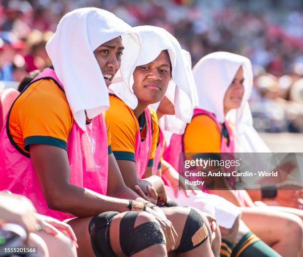 Tabu Tuinakauvadra and Jasmin Huirwai of the Australia Wallaroos look on from the players' bench during the first half against U.S. In the World...