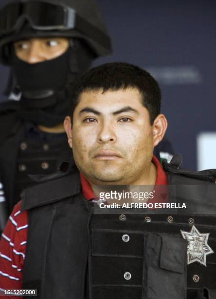 Jaime Gonzalez Duran, a.k.a. "Hummer", founder of a group of hitmen called the "Zetas", is shown to the press at the hangar of the Federal Police in...