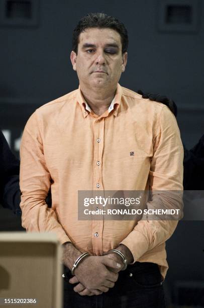 Alleged drug trafficker Manuel Fernandez Valencia aka "La Puerca" and other members of the Sinaloa cartel are presented to the press in Mexico City,...