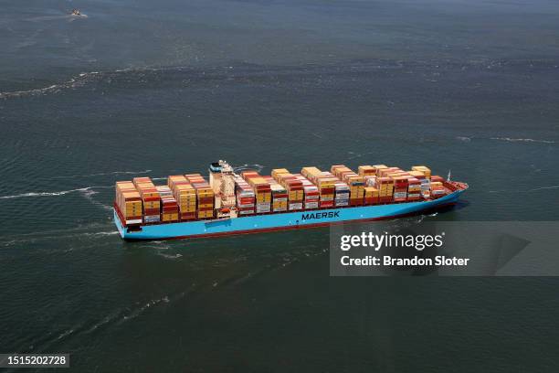 An aerial view of a Maersk shipping container cargo ship in San Francisco Bay on May 30, 2023 in San Francisco, California.